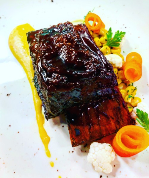 Beef short rib with sweetcorn puree and pickled carrot and cauliflower by Berwick Lodge